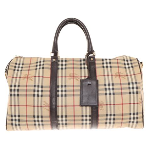 borsa viaggio burberry|Scopri la nuova collezione di borse Burberry donna su FARFETCH.